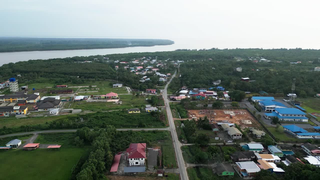 Aerial Drone View During Summer Kabong Fishing Village,With River And Beach,Sarawak,Borneo