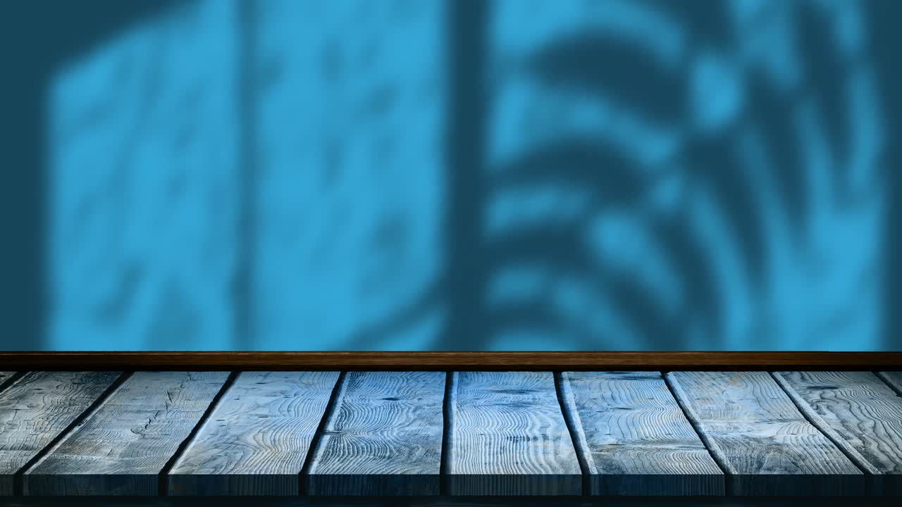 Animazione di foglie e ombra della finestra su sfondo blu e di legno