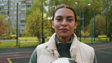 woman holding a ball