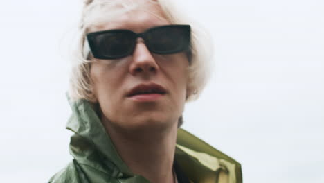 blond man with sunglasses outdoors