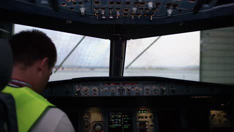 airplane cockpit view during pre-flight preparation