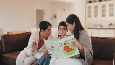 family, grandmother and mother reading to her son