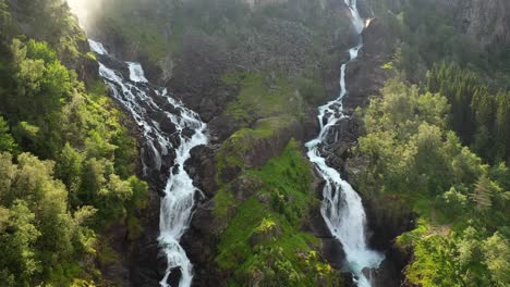 Latefossen-is-one-of-the-most-visited-waterfalls-in-Norway-and-is-located-near-Skare-and-Odda-in-the-region-Hordaland,-Norway.-Consists-of-two-separate-streams-flowing-down-from-the-lake-Lotevatnet.