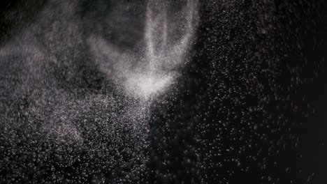 powder isolated on black background