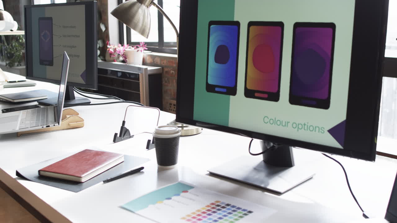 el monitor de la computadora en un entorno de oficina de negocios muestra las opciones de color para la aplicación de teléfono