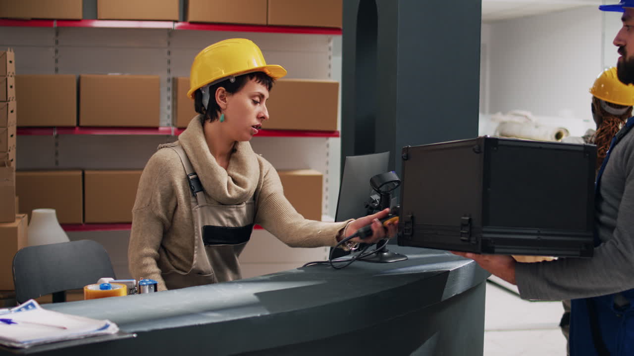 Warehouse workers scanning boxes