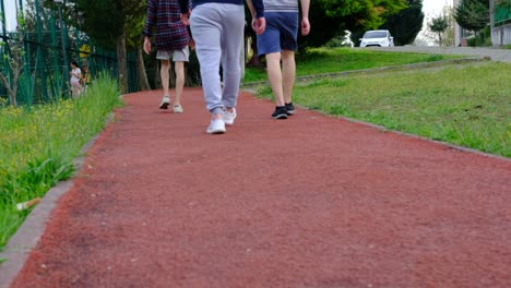 three man walking park