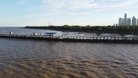 HD-shot-of-a-pier-in-Buenos-Aires,-Argentina-with-the-Buenos-Aires-cityscape-in-the-background