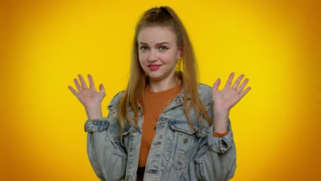 Student-girl-in-denim-jacket-closing-eyes-showing-stop-gesture,-confused-shy-scared-to-watch