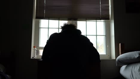 silhouette of a person praying