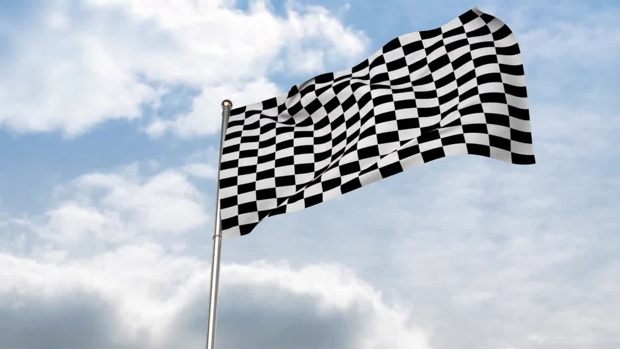 Drapeau à damier ondulant dans un ciel nuageux