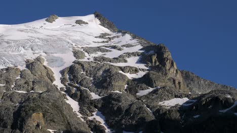 winter snow at the rock mountain hike at joffre lakes provincial park in pemberton, british columbia, canada