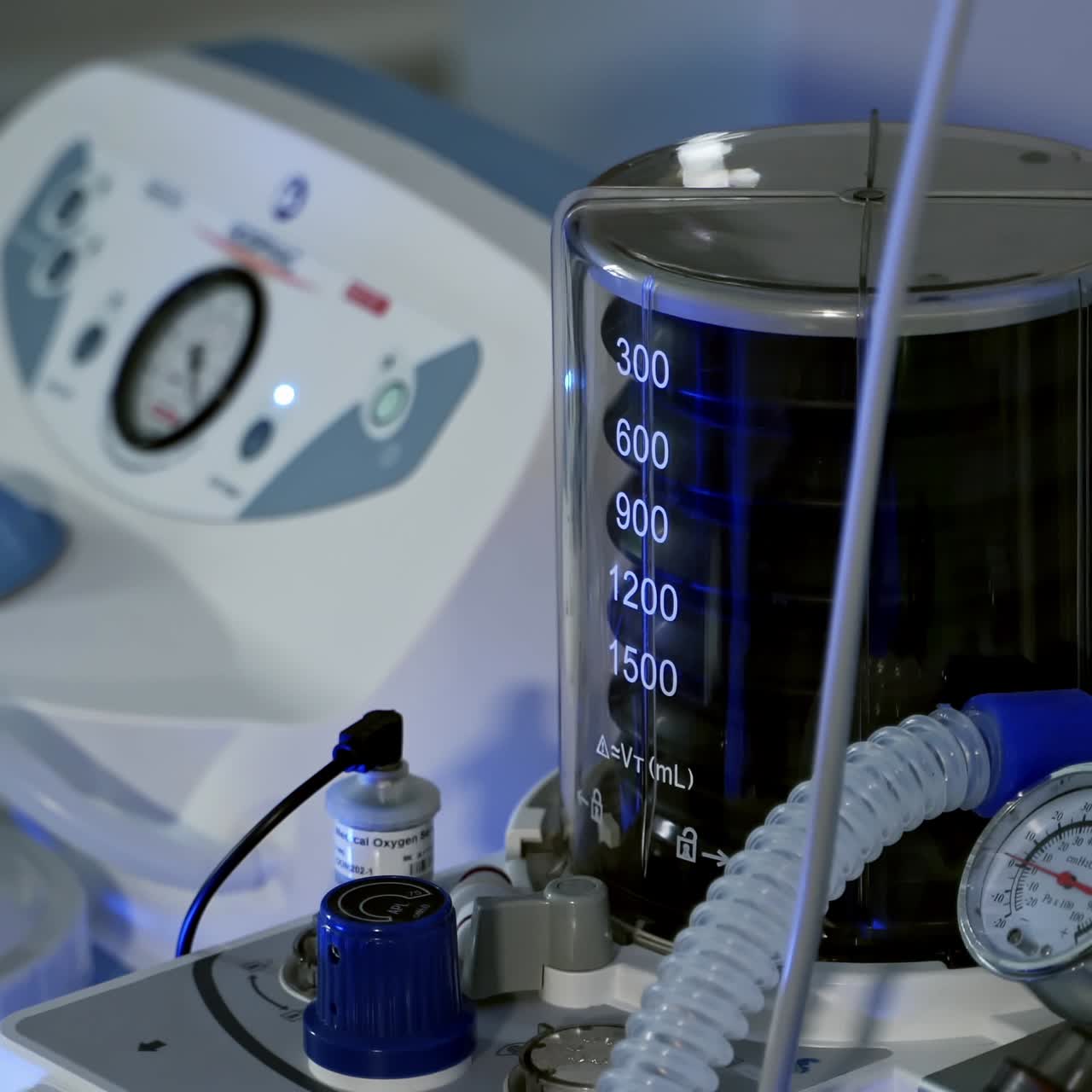 Modern ventilation apparatus. Artificial ventilation machine in the icu. Motion of pulmoflator device. COVID-19 and coronavirus.Close-up.