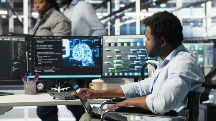 Data center computer scientist in wheelchair using AI node tree software