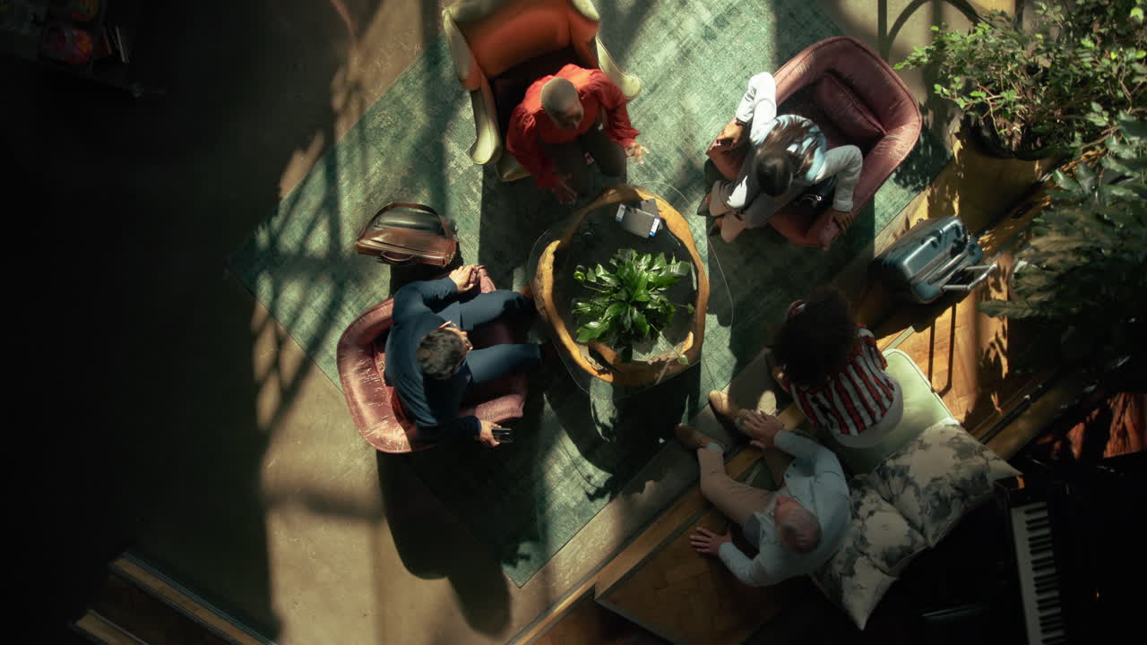 Overhead view of people meeting in modern interior
