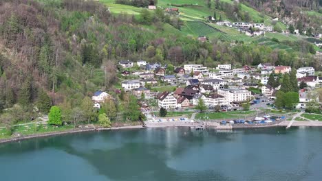 the calm walensee lake with the town of walenstadt on its shores