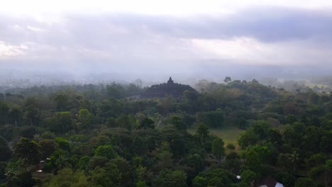 dreamy aerial of unesco temple borobudur, circling wide shot