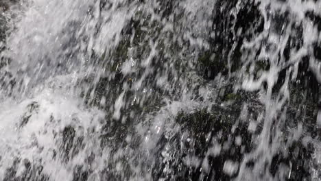 slow motion for motion background of water crashing down waterfall