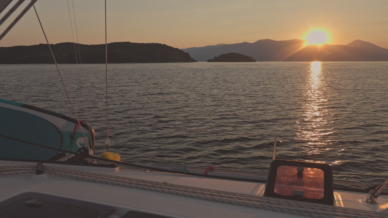 LEFKADA, GREECE - 11 AUGUST 2025 : view from a yacht at sea in lefkada, greece at sunrise