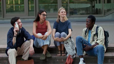 friends sitting on stairs