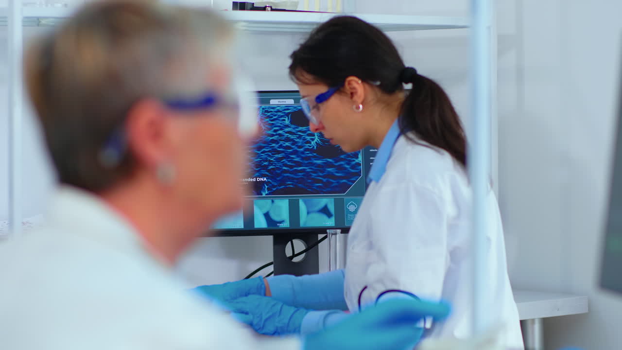 Woman research chemist testing virus sample