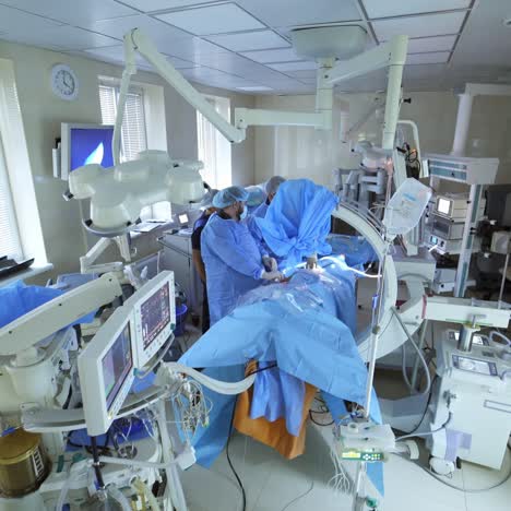 operation using laparoscopic equipment. surgeons team during laparoscopic abdominal operation on patient in surgery room