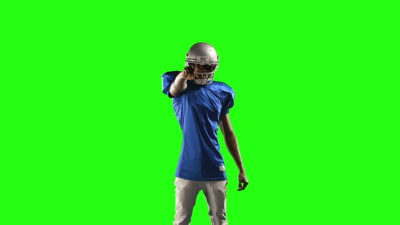 Giocatore di football americano su green screen