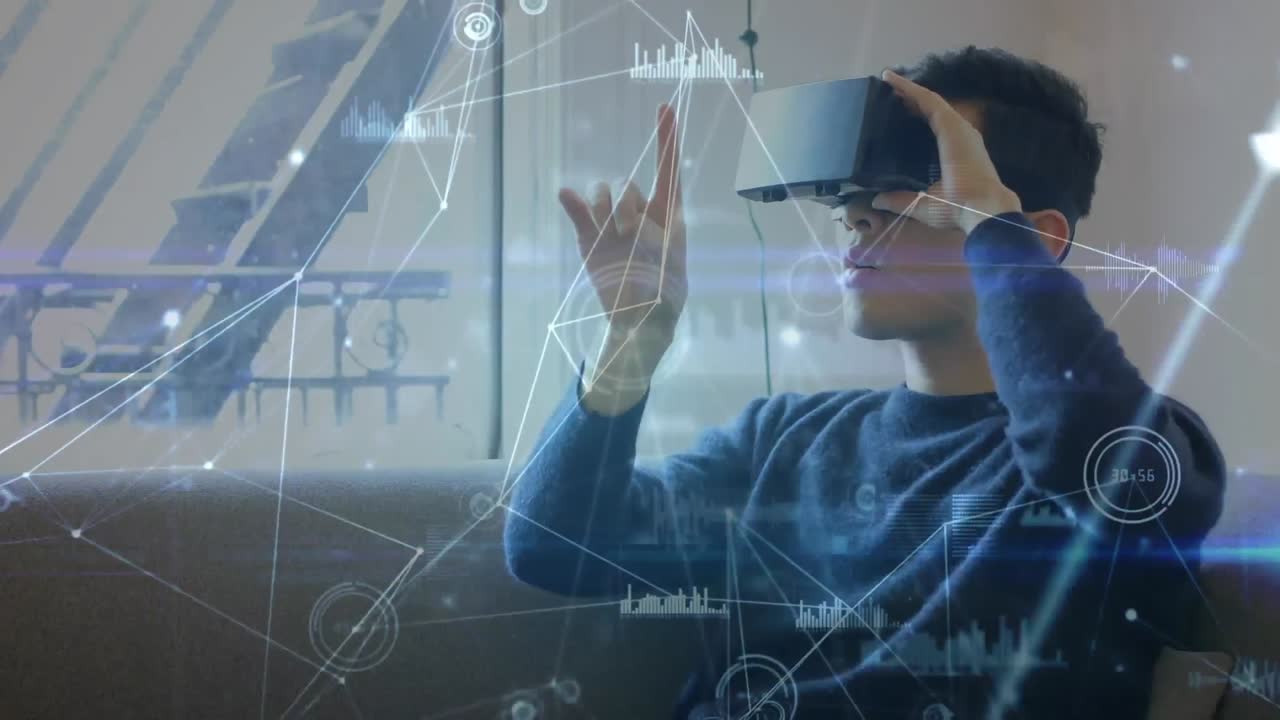 Man sitting on a couch wearing a virtual reality headset