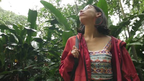 Woman--looking-up-in-nature-scenery