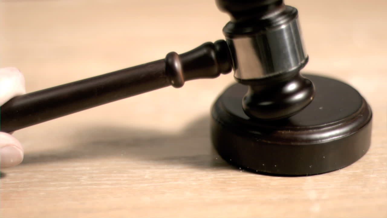 Gavel hitting in super slow motion a sound block