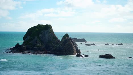 Island-Ballet:-Seagulls-gracefully-dance-around-an-enchanting-island-in-this-mesmerizing-aerial-spectacle