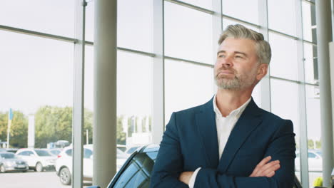 businessman in a car dealership