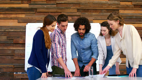 business executives discussing over project in meeting