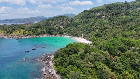 tropical beach with turquoise water and lush vegetation