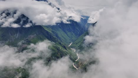 aerial shot in reverse, with the drone pulling back to reveal the majestic colca valley, as clouds slowly part to expose its vast beauty.
