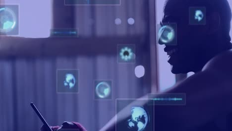 animación de pantallas digitales con datos sobre las manos de un hombre afroamericano que usa un teléfono inteligente
