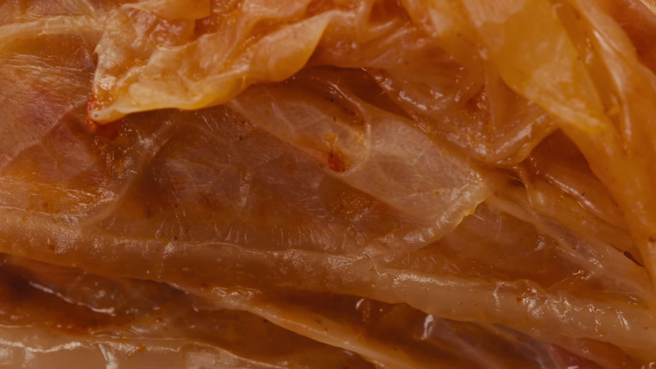 Close-up of texture fermented spicy cabbage kimchi with in can. Preservation of vegetables in glass jars. Fermentation preserved kimchi cabbage with spices macro. Asian cuisine.