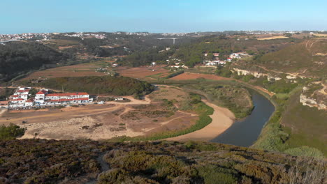 aerial of lizandro river in ericeira city a