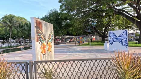 outdoor art display among trees and pathways