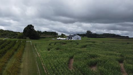 barn sits in field of green