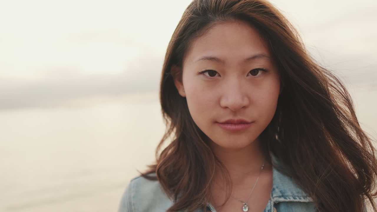 Portrait of a smiling woman at the beach