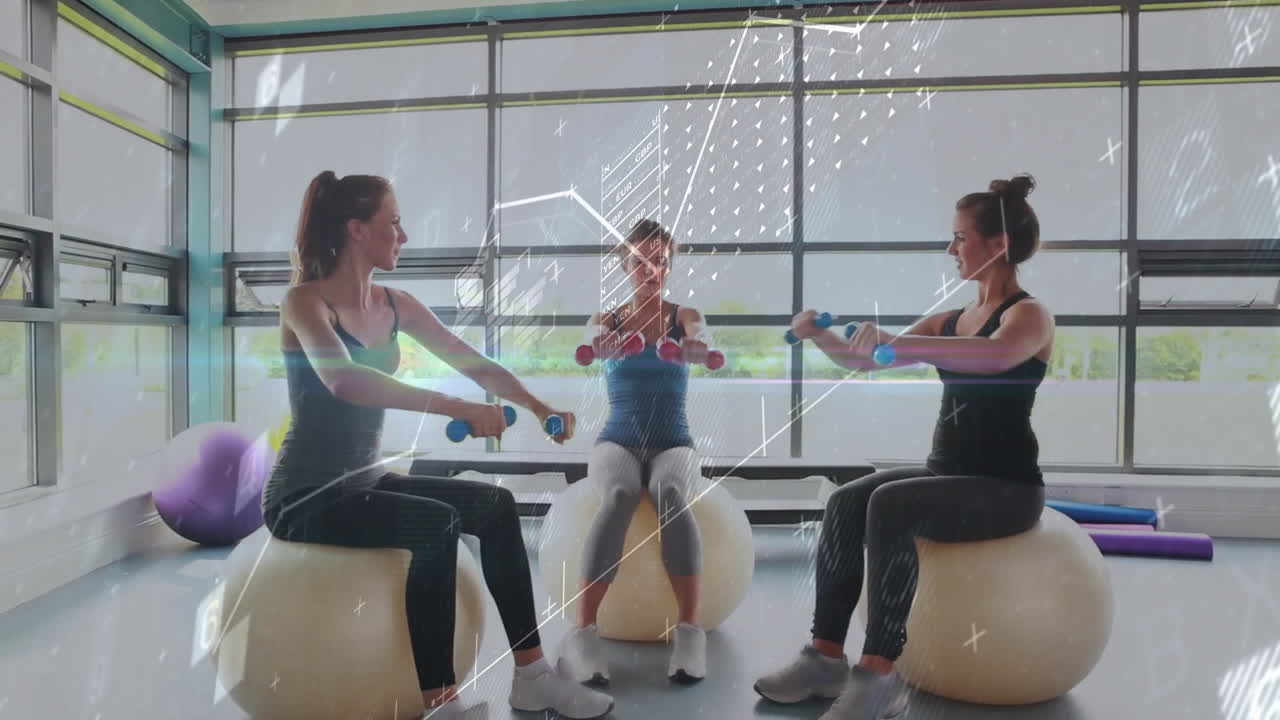 Three women lifting dumbbells on stability balls in fitness studio, with animated chart overlay