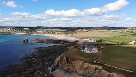 aerial view of sea lavender cottage on devon headland overlooking the english channel