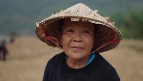 elderly asian woman farmer in vietnam