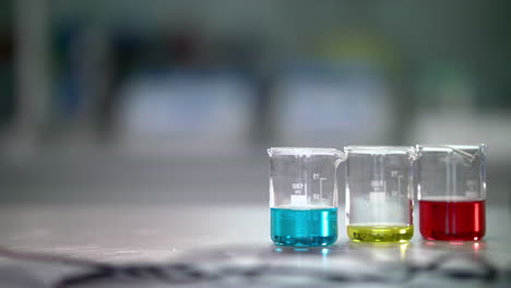 Laboratory-glassware-with-chemical-liquid.-Closeup-of-lab-flask-with-reagents