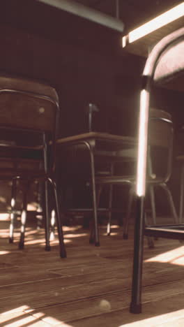 empty classroom with wooden desks and chairs