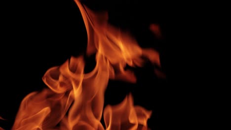 Flames-of-fire-on-black-background-in-slow-motion