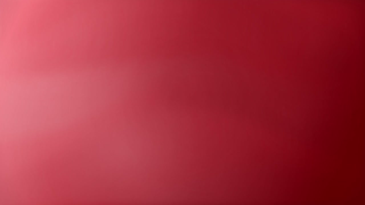 Smooth red gradient waves flow slowly across the screen in a seamless looping animation