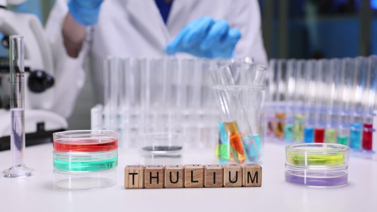 Scientist conducting chemical experiments with Thulium in a laboratory