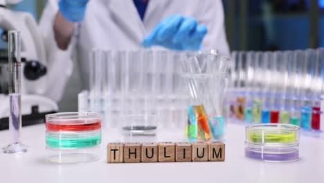scientist conducting chemical experiments with thulium in a laboratory
